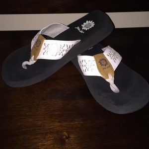 Black and white yellow box flip flops
